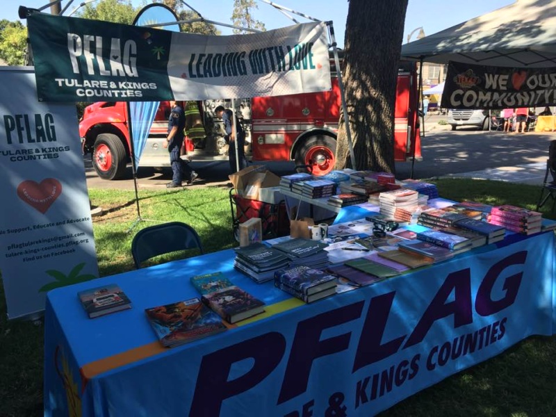 Giving out free books at the Tulare County Library Book Festival 2024